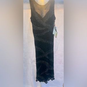 NWT beaded evening dress. Swooped part pictured is the back of dress